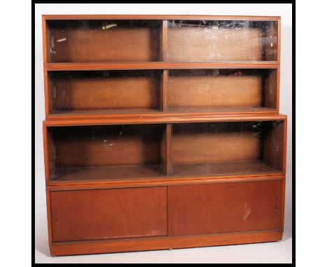 RETRO 'SIMPLEX' LIGHT MAHOGANY SECTIONAL BOOKCASE in the Globe Wernick style, the three section top with glazed sliding doors