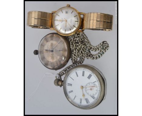 A silver metal cased pocket watch stamped to the movement Moulinie Geneve along with another silver metal pocket watch having