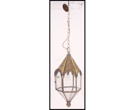 A very large brass external hanging light, glass panels divided by rope twist brass work. Measures: 61 x 25 cm.
