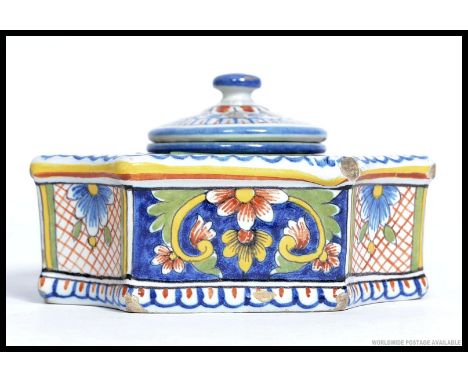 An Italian Faience ceramic inkwell, complete with inner well and lid. Beautifully hand painted in typical form.  W12cm 