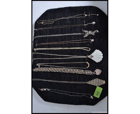 A good group of ten silver and white metal ladies necklaces to include Tiffany style marked 925 and a mother of pearl example