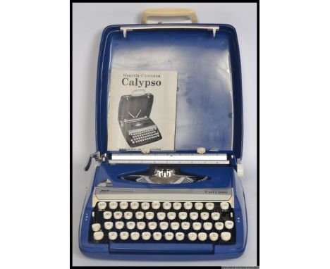 A little used retro cased Smith Corona Calypso typewriter, with the original instructions