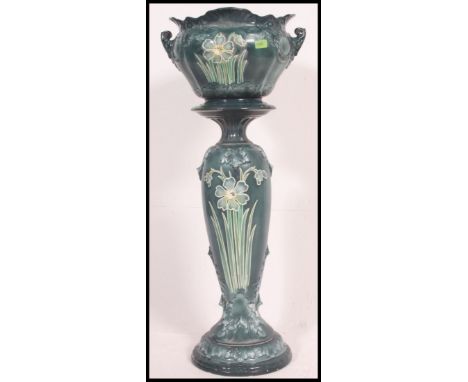 A High Art Nouveau large ceramic pedestal planter. Tulip style design with blue glaze to the plinth and planter. H16 x W45cm 