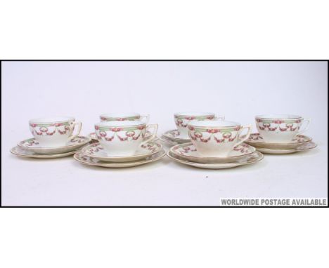 A set of 6 Staffordshire ceramic trio's in a chintz - part tea service comprising cups, saucers, plates etc