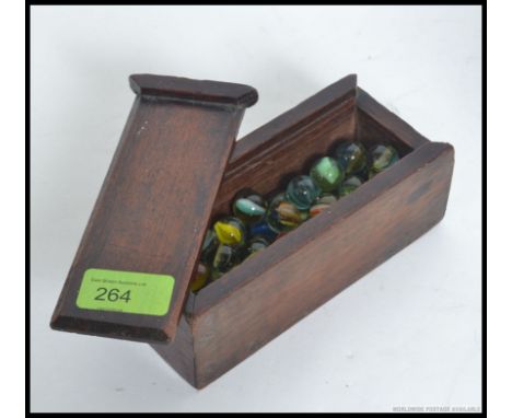 A collection of approx 45x vintage (possibly antique) glass marbles. All of varying design to include onion skin, helix and o