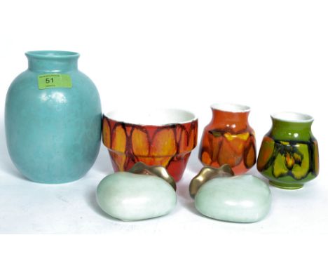 A collection of retro and vintage Poole pottery dating from the earlier part of the 20th century along with a pair of West Ge