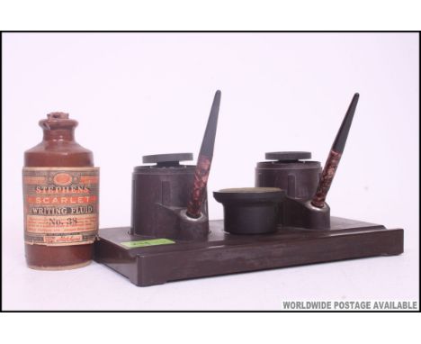 A fabulous 1930's Art Deco bakelite desk tidy inkwell with twin pots and pens. Also with a pot of unopened Stephens Scarlet w