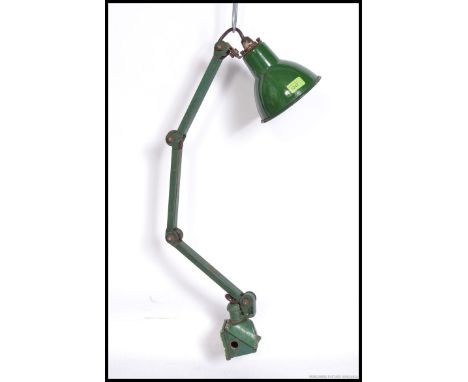 An excellent early Industrial heavy metal wall / block mount anglepoise lamp in original green paint. Block electrical mount 