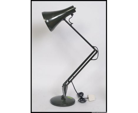 A vintage retro industrial Herbert Terry anglepoise lamp light in khaki green colour. 85cm tall.