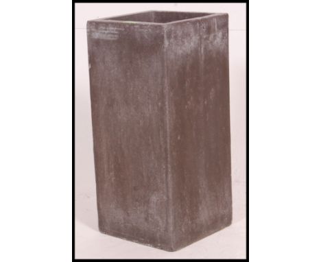 A contemporary large floor vase - stick stand of square form ( description to be updated ). Measures: 50 x 23 x 23 cm.