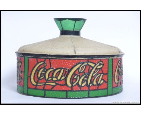 A vintage mid century Coke Cola advertising promotional plastic light shade , in the form of  coloured lead lined glass