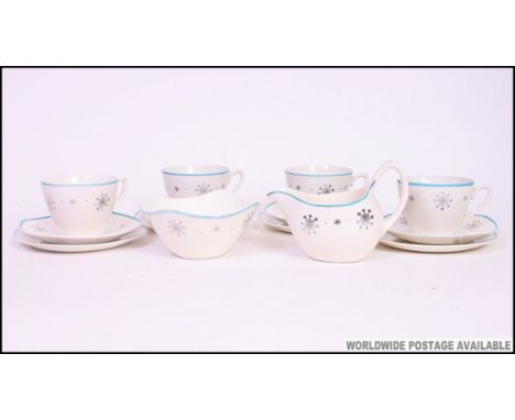 A fabulous Midwinter Modern ' Fashion Series ' 1950's part tea service comprising 4 trios, milk and sugar bowl
