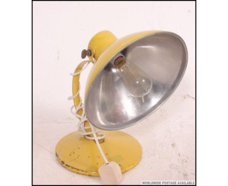 A vintage retro original ' Radiaray ' heat lamp - aluminium construction, in yellow. 