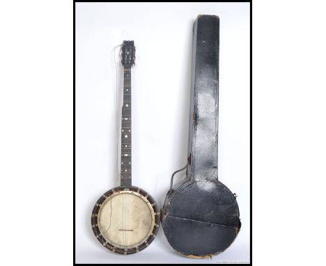 A vintage cased Banjo. Mahogany back with skin having long ebonised neck and head. Complete with the case.