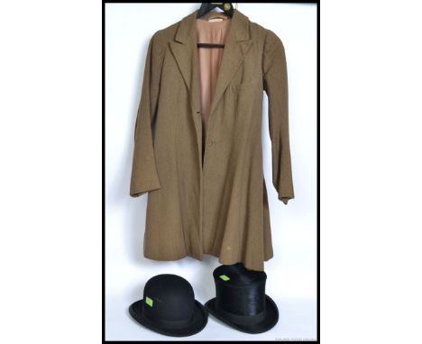 A vintage 20th century ladies tweed hunting - riding jacket. Together with a a pair of leather riding boots, bowler hat by Ga