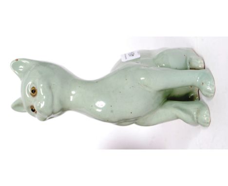 A West Country pottery figurine of a cat in the Galle style reputed to be Aller Vale. Unmarked with glass eyes.