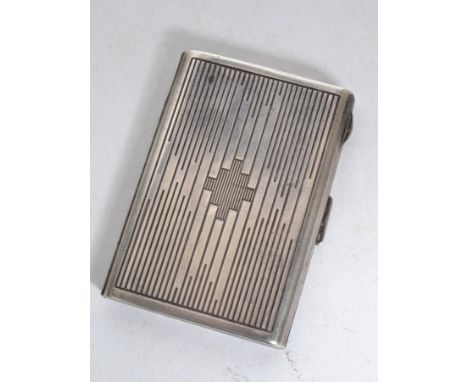 A silver ( tests ) continental cigarette case of rectangular form with unusual design with push button clasp. Total weight 81