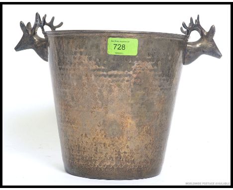 A vintage 20th century silver plated ice bucket - champagne bucket with stag head handles - hunting interest. H20cm 