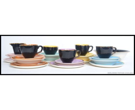 A Palissy mid century A.E. Jones Palissy ' Madeline ' 29 piece harlequin tea service