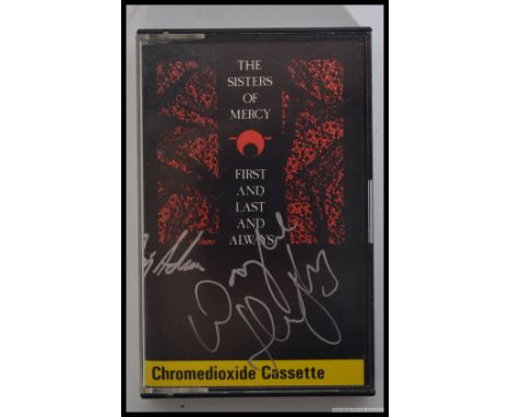 The Sisters Of Mercy - The Sisters Of Mercy ' First And Last And Always ' cassette tape being signed by  Wayne Hussey and Cra