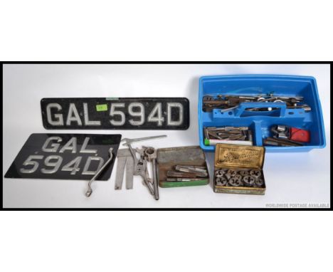 A collection of vintage Motorcycle / Car tools, to include spanners, taps and dies, light bulbs also with a 1960's matching f