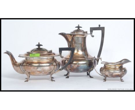 A good quality three piece silver plated tea service consisting of a teapot, coffee pot and creamer