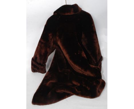 A ladies vintage  full length simulated faux fur coat, with button fastners to centre