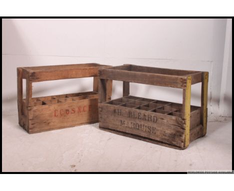 A collection of vintage wooden rustic style wine crates with shabby chic finishes having notation - Ex BBC props - James Mart