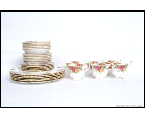 A Royal Albert Old Country Roses part tea service comprising cups, saucers, plates, dinner plates etc