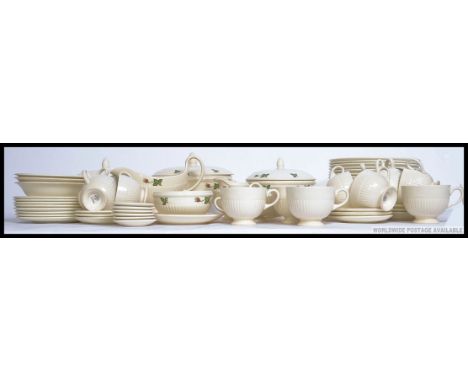 A Wedgwood Moss Rose part tea / dinner service to include cups, saucers, plates, bowls, tureens etc