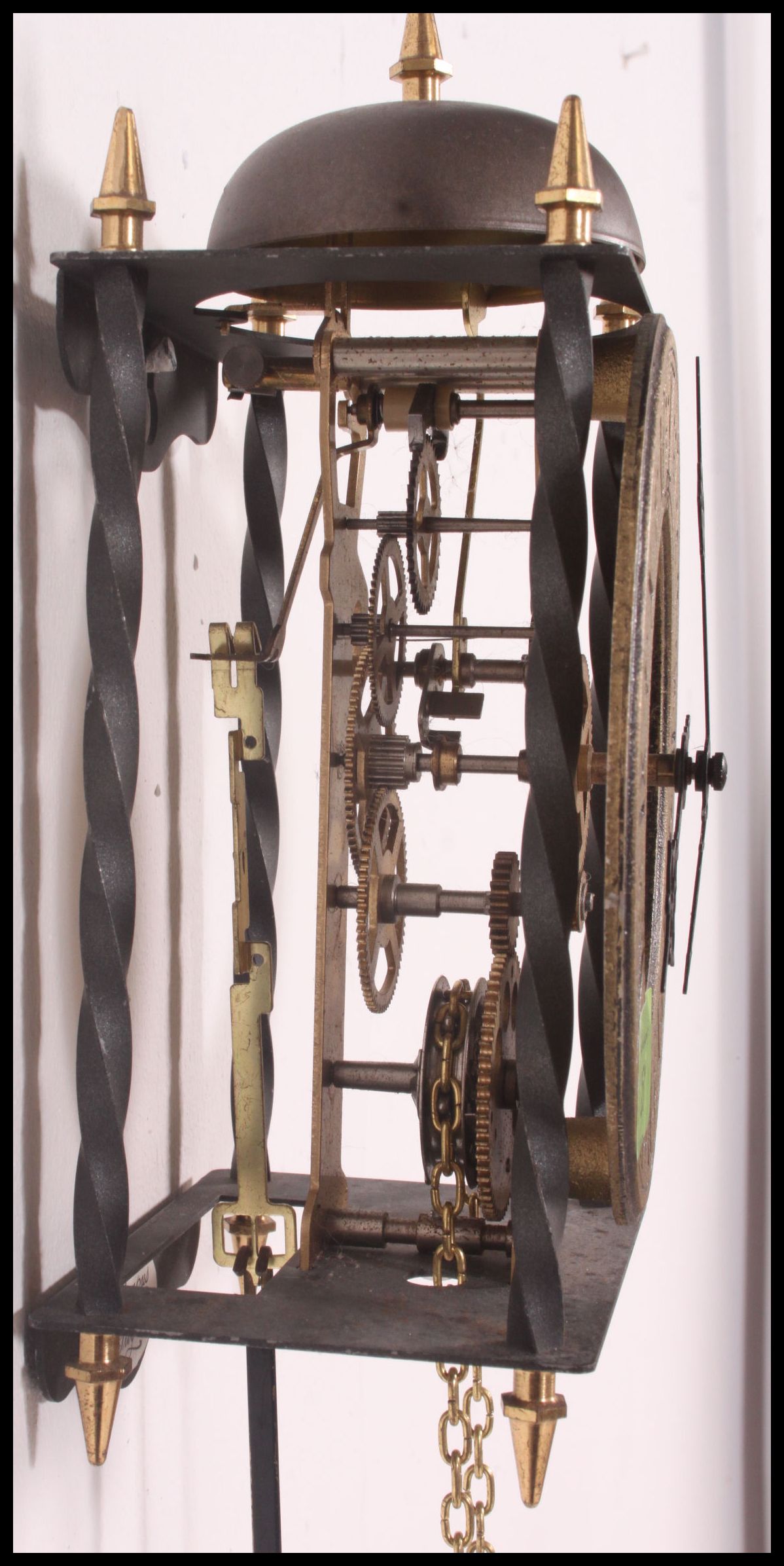 A Tempus Fugit wall skeleton clock marked for ' Hermle ' with pendulum