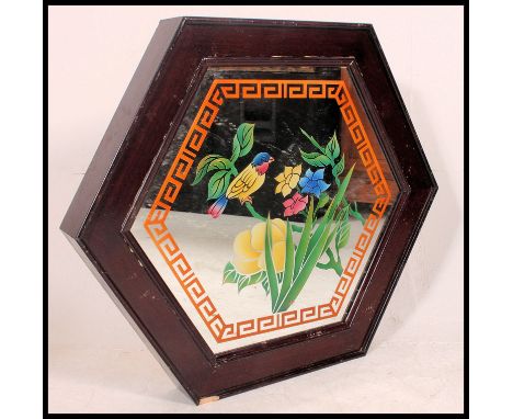A large 20th century handpainted mirror set within a large Octagonal mahogany effect box with the ability to place a light to