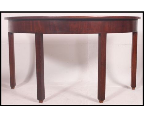 A Georgian mahogany demi lune console table - hall table. The squared legs with fitted frieze frame having d-end shaped top a
