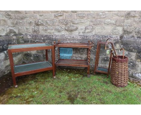 An Oak tea trolley, mid century tea trolley, four division stick stand and a wicker stick stand and contents ,&nbsp; Mid cent