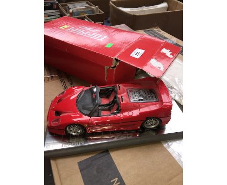 A boxed Ferrari F50 moddel car 