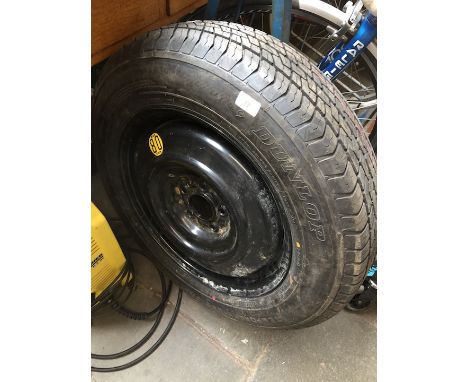 A Dunlop spare wheel - 185 / 80R17 95M 