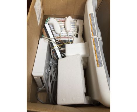 A Wii console, board and games 