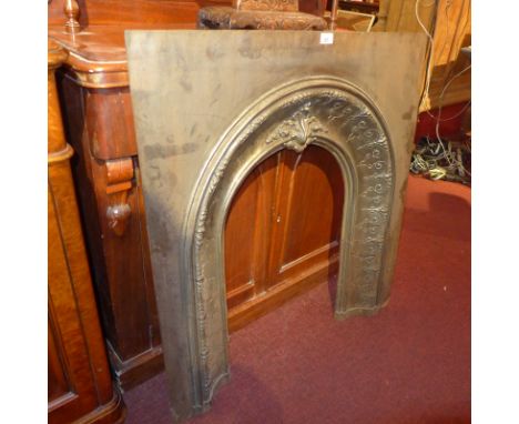 SOLD IN TIMED AUCTION A late Victorian cast iron fire surround
