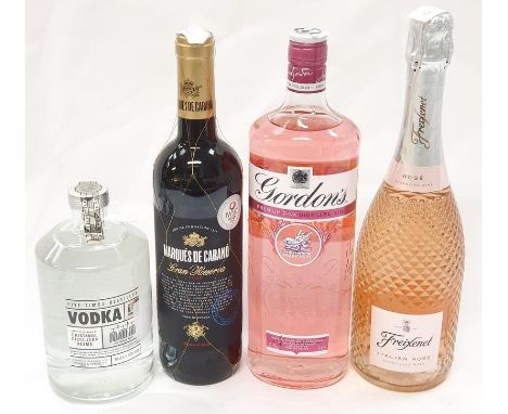 Four bottles of alcohol: 1L Gordons Pink gin, 70cl Vodka, Gran Reserva wine and Freixenet Rose Sparkling wine (Ref 47/177). 