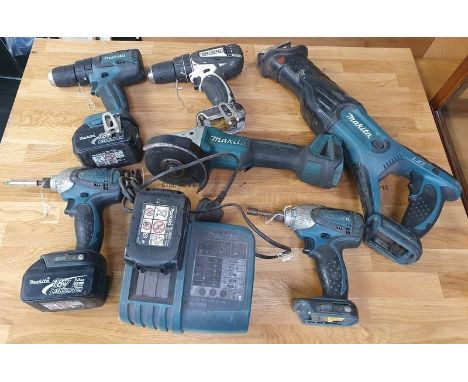 Various Makita Power Tools to include four drills, angle grinder, DJP181 saw and a battery charging station (REF 79). 