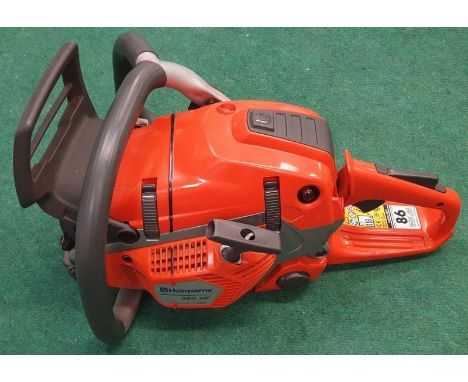 A Husqvarna 560 XP Chainsaw (REF 23). 