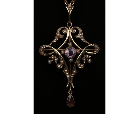 A gold, amethyst and seed pearl pendant brooch in a pierced scrolling and foliate design, detailed '9ct', length 5.7cm, with 