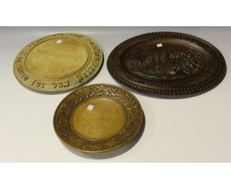 A group of collectors' items and kitchenalia, including two carved breadboards, three 19th Century wooden handled cutters, a 