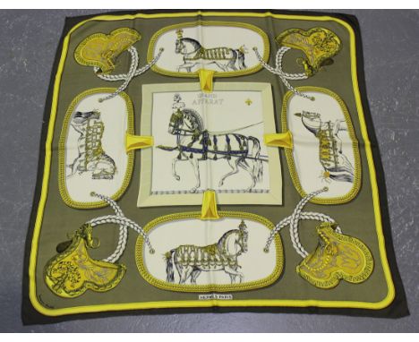 An Hermès silk scarf, printed with the 'Grand Apparat' pattern, designed by Jacques Eudel, 84cm x 88cm, together with another