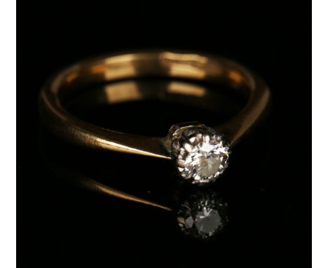 A gold and diamond single stone ring, mounted with a circular cut diamond, ring size approx K. 