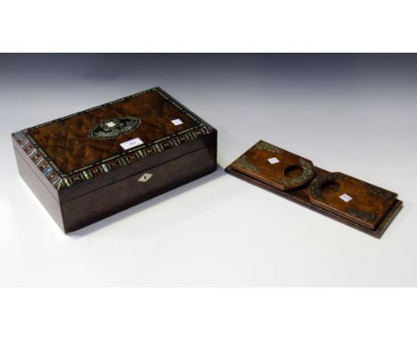 A mid-19th century French thuya workbox, inlaid with pewter and mother-of-pearl, the hinged lid enclosing a fitted interior, 