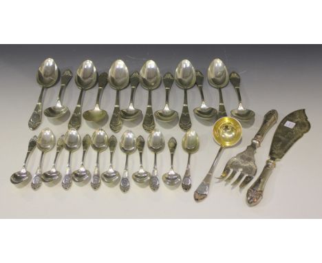 A Russian silver canteen of cutlery, 84 zolotnik, comprising twenty-four table knives and forks, twelve tablespoons, twelve t