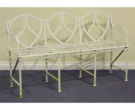 An early 20th century Regency style wrought iron white painted slatted garden bench, height 91cm, length 154cm.
