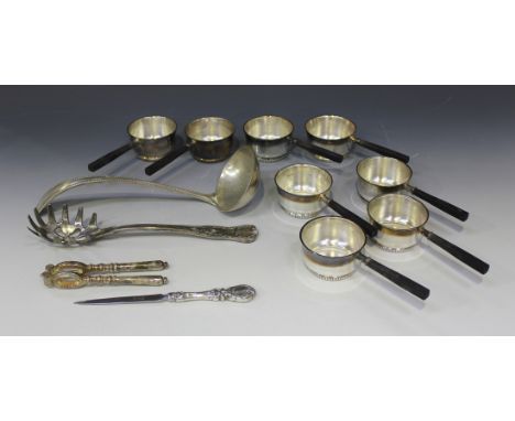 A collection of plated items, including a King's pattern spaghetti server, a pair of nutcrackers, a beaded Old English patter