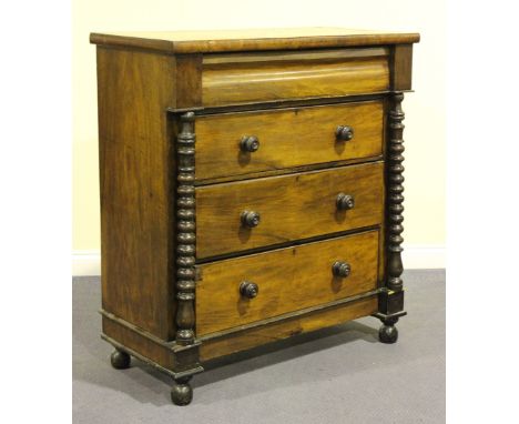 A Victorian walnut chest of four long drawers with bobbin turned pilasters, on turned feet, height 116cm, width 117cm, depth 